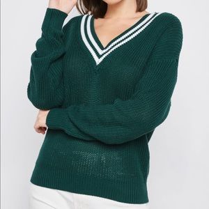Green sweater with varsity stripes size medium
